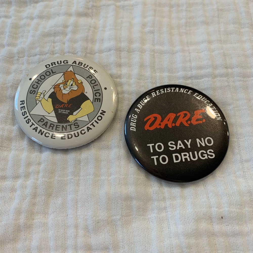 2 D.A.R.E. Buttons.